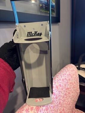 Can crusher with screws to put on wall